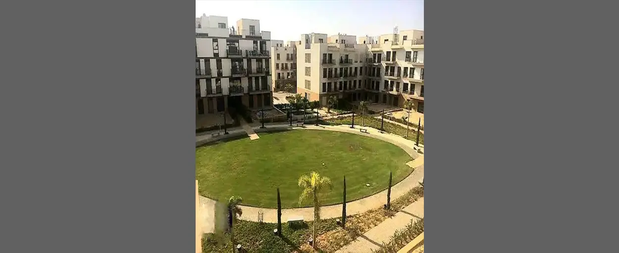 Courtyard - Westown | شقة